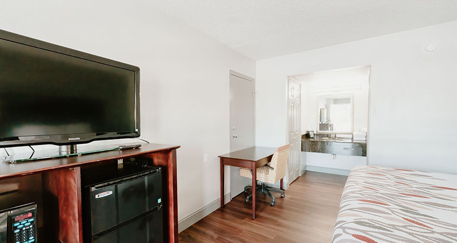 Guest Room at Sandston Inn & Suites